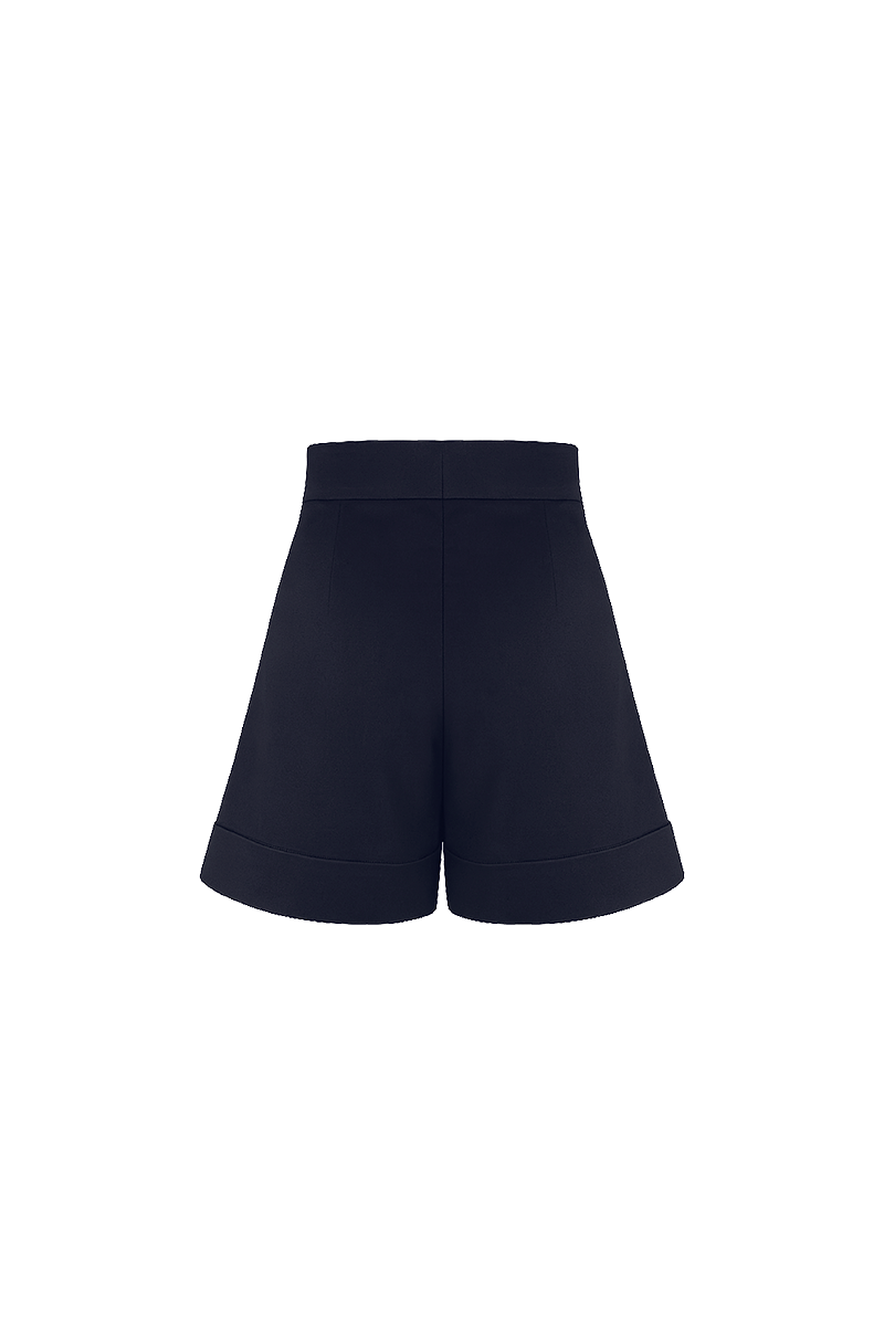 Navy blue Capriccio shorts by ANA + MARIA, shown in a ghosted photo with relaxed fit and waistband detail.