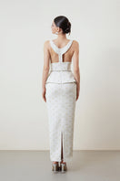 White Tweet top and skirt co-ord set by HACCHIC COUTURE, featuring a stylish matching crop top and high-waisted skirt.