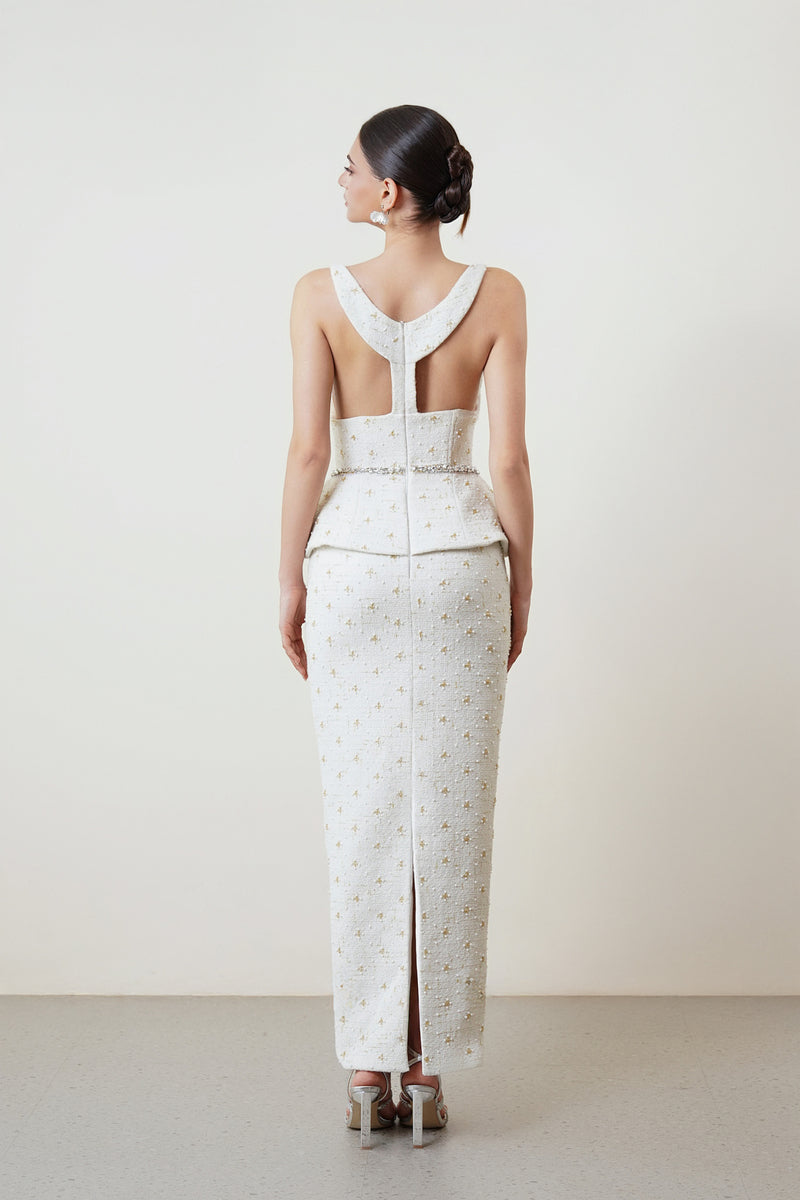 White Tweet top and skirt co-ord set by HACCHIC COUTURE, featuring a stylish matching crop top and high-waisted skirt.