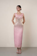 Pink brocade open-back gown by HACCHIC COUTURE, featuring intricate fabric details and elegant design.