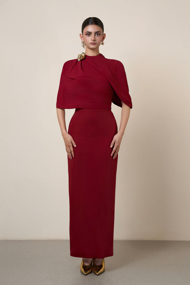 Red HACCHIC COUTURE MOAZ maxi dress featuring flowing fabric and elegant design, shown in a full-length image.