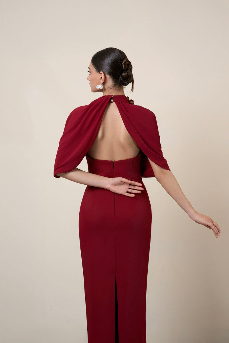 Red MOAZ maxi dress by HACCHIC COUTURE featuring flowing fabric and elegant design, shown on a model.