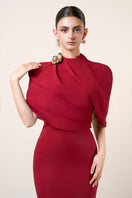 Red MOAZ Maxi Dress by HACCHIC COUTURE featuring flowing fabric and elegant design, shown on a mannequin.
