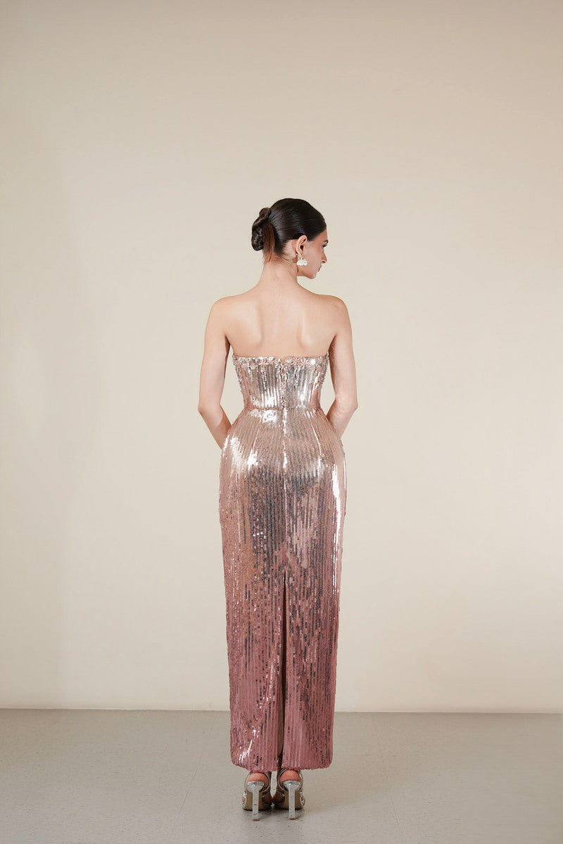 Elegant rose sequin gown by HACCHIC COUTURE featuring intricate sequin details and a flowing silhouette.
