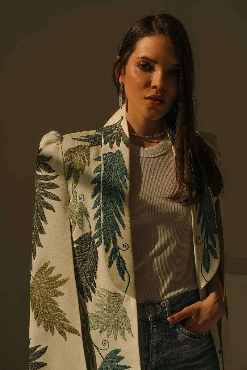 Nadya Shah Cara Leaf Cape jacket featuring a stylish leaf print design and flowy fabric.