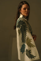 Nadya Shah Cara Leaf Cape jacket with a vibrant leaf pattern, flowing fabric, and stylish design for a fashionable layered look.