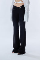 Black Carats belt pants by Stolen Stores featuring a sleek design and belt detail, shown in a close-up view.
