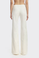 Off-white Carats belt pants by Stolen Stores featuring a stylish fit and prominent belt detail, perfect for a modern casual look.