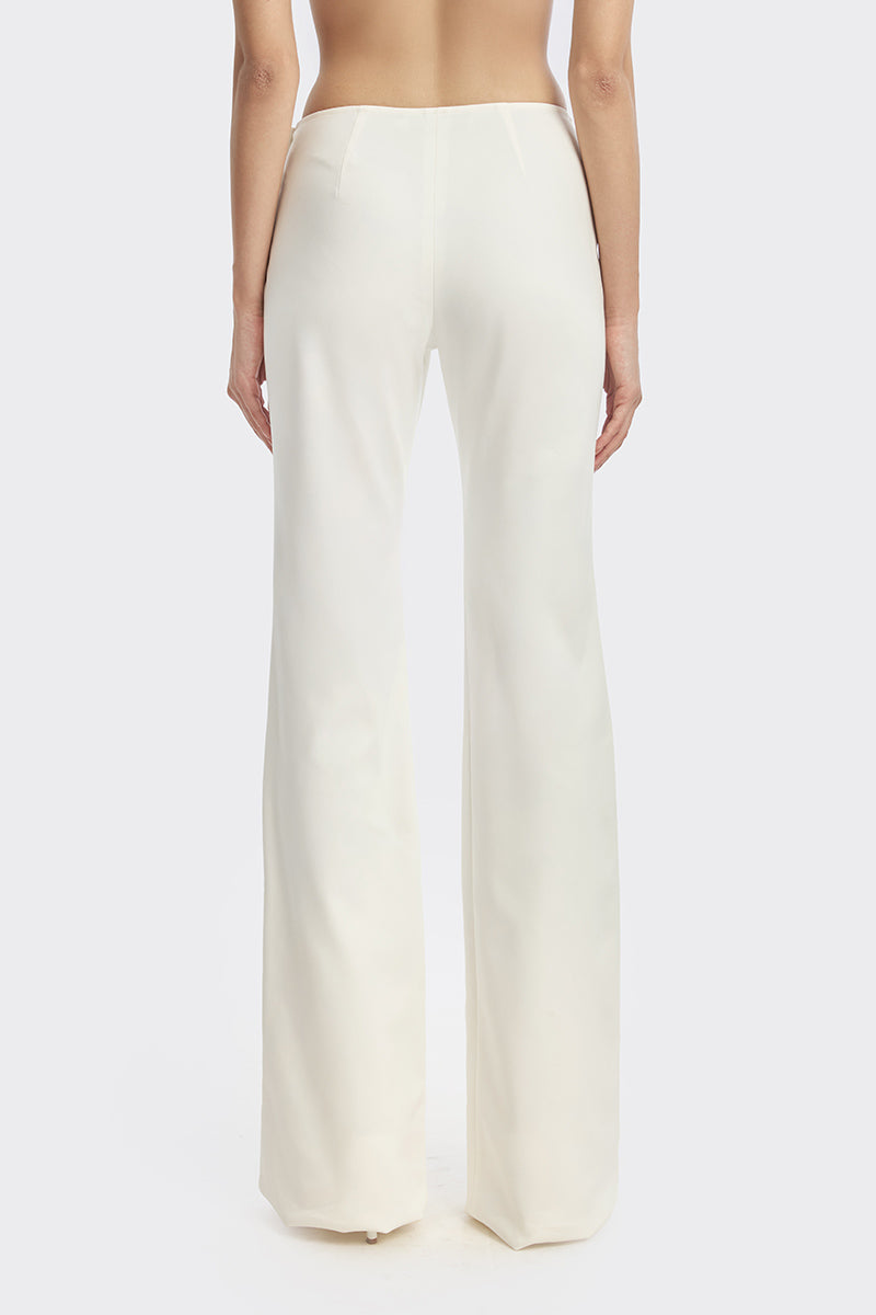 Off-white Carats belt pants by Stolen Stores featuring a stylish fit and prominent belt detail, perfect for a modern casual look.