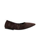 A pair of brown satin flats from AERA with a sleek, elegant design and pointed toe, perfect for casual or formal wear.