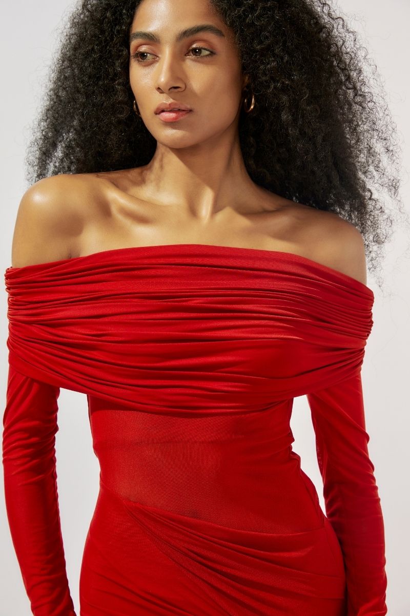 Maroon draped gown by Deme By Gabriella with elegant fabric and stylish design, perfect for formal occasions.
