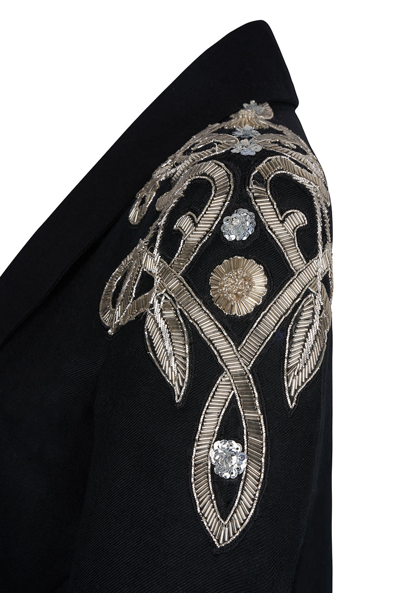 Nadya Shah Carmen black jacket featuring a tailored blazer style, with lapels and sleek design on a plain background.