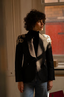 Nadya Shah Carmen black jacket, stylish blazer with tailored fit and sleek design, displayed on a mannequin.