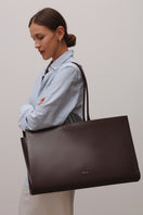 Brown POELLE Carolyn tote bag in medium suede, shoulder bag with spacious interior and stylish design.