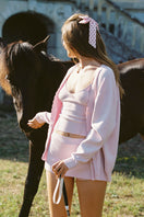 Pink Nana Jacqueline Carrie shorts displayed on a model, showcasing a stylish casual look with a comfortable fit.