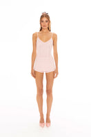 Nana Jacqueline pink Carrie shorts shown on a model, featuring a stylish fit and vibrant color for casual or summer wear.