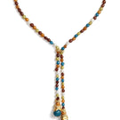 Gold and white cascade necklace by Jude Benhalim featuring layered chain design and elegant jewelry style.