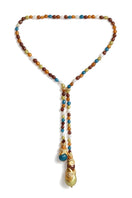 Gold and white cascade necklace by Jude Benhalim featuring layered chain design and elegant jewelry style.