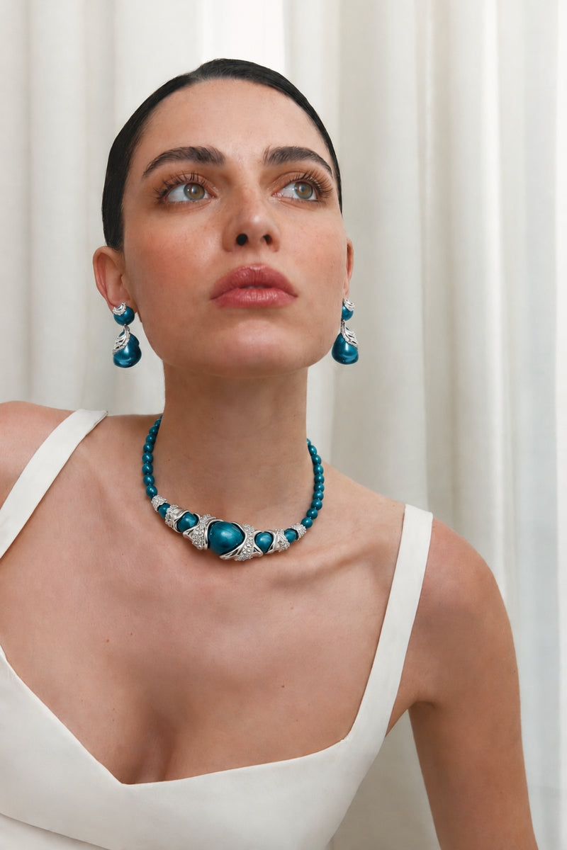 Rhodium blue cascade choker necklace by Jude Benhalim featuring layered chain design and elegant style.
