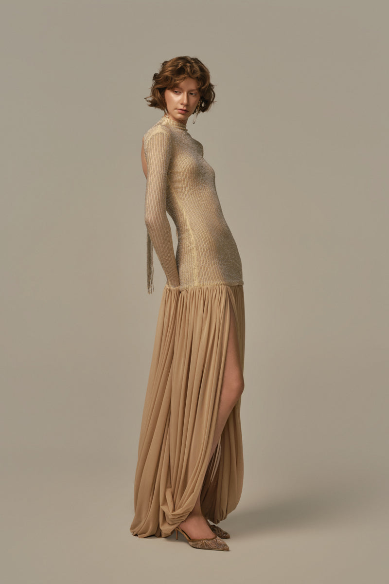Poem Cascade gown in warm sand color, flowing fabric with ruffled details, elegant evening wear for formal occasions.