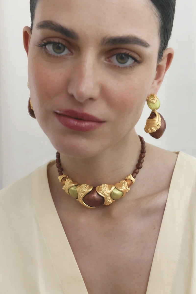 Gold and brown cascade earrings by Jude Benhalim with layered, flowing design and intricate detailing.