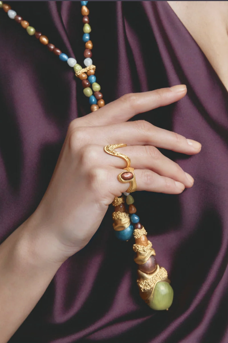 Gold and mixed-metal Cascade Necklace by Jude Benhalim with cascading chain design and elegant finish.