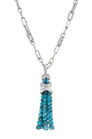 Blue rhodium-plated cascade pendant necklace with house chain by Jude Benhalim, showcasing a layered, elegant design.