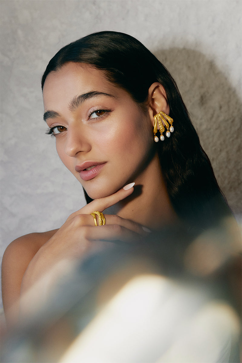Gold Cassandra standard ring by Jude Benhalim featuring a sleek band design with elegant craftsmanship.