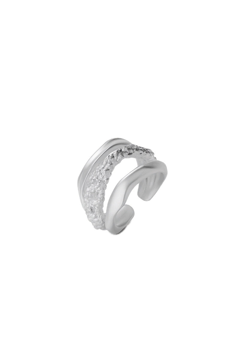 Silver Cassandra ring by Jude Benhalim featuring intricate design and polished rhodium finish.