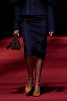 Lili Blanc Camelia Heels in black, stylish women's high heels with pointed toes and stiletto heels displayed on a runway.