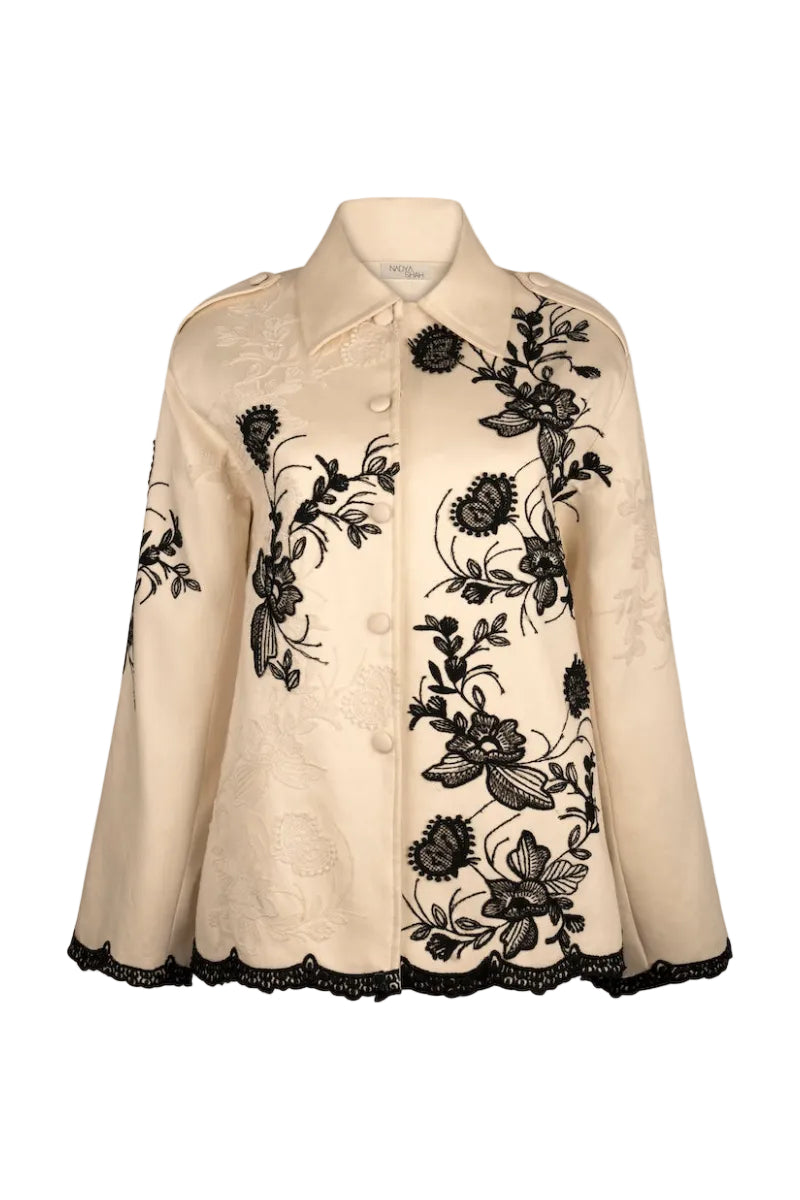 Nadya Shah CELINE CARGO jacket displayed on a mannequin, featuring a stylish, fitted design with front pockets and a sleek silhouette.