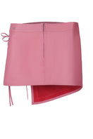 Celine blush pink leather mini skirt by Double A, featuring a fitted silhouette and stylish design, shown on a model.