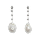 Silver Baroque Pearl Earrings by LAVANI JEWELS featuring elegant, irregular-shaped pearls with a sleek silver setting.