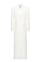 Matters Ivory Celine coat displayed on a hanger, showcasing elegant, lightweight coat with clean lines and classic style.