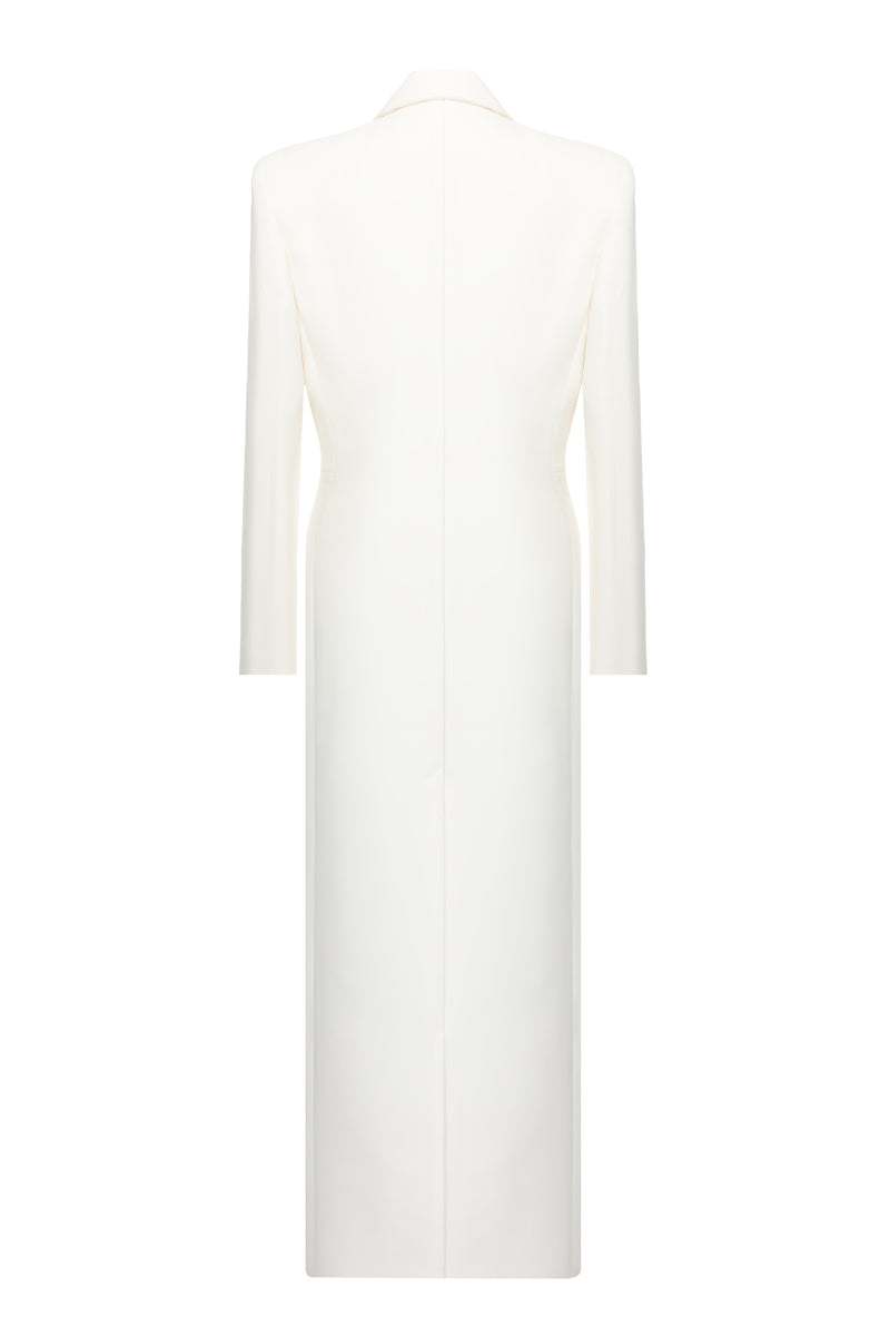 Matters Celine ivory coat displayed on a hanger, showcasing sleek design and elegant fabric in a well-lit setting.