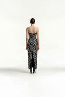 Elegant strapless midi dress by Tayfun Kaba with chain embellishments, featuring a fitted silhouette and stylish design.
