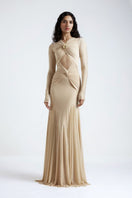 Beige Chantal gown by Deme By Gabriella featuring elegant fabric and flowing design, shown hanging against a neutral background.