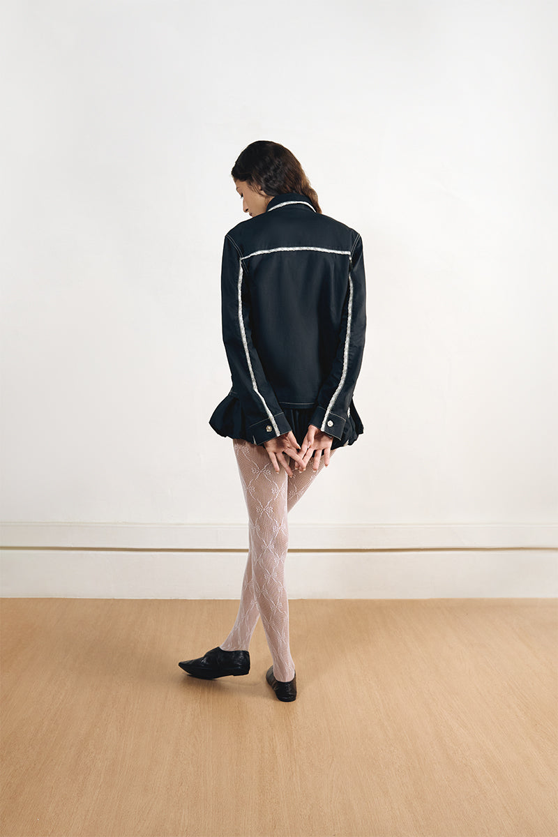 Back view of YASSMIN SALEH charcoal black shirt, showcasing its stylish design and fit.
