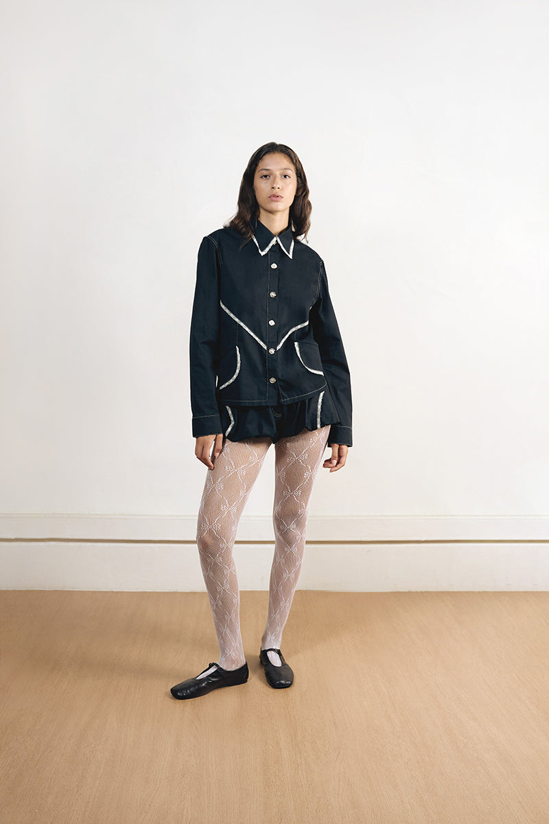 Black charcoal shirt by Yassmin Saleh, front view showing classic collar and button-down design.
