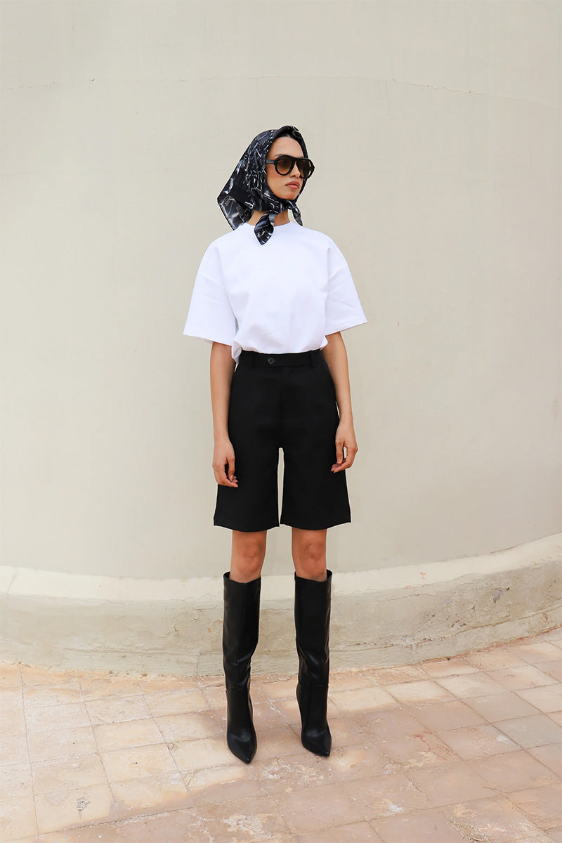 Black silk Charkol scarf by Amel Batita featuring a flowing design and elegant style, perfect for versatile head and neck wear.