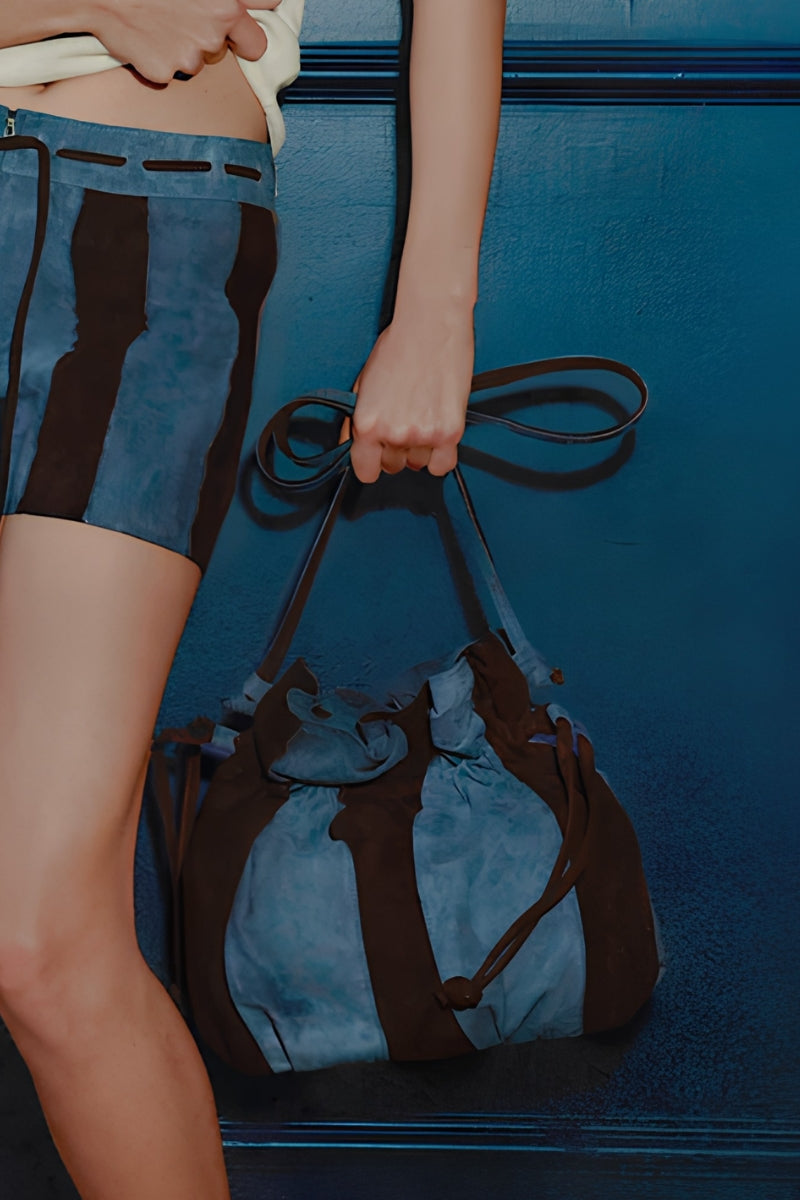 Double A Charlie II suede shoulder bag in blue, featuring a soft suede texture and stylish design.
