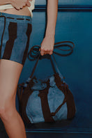 Double A Charlie II suede shoulder bag in blue, featuring a sleek design and soft texture, perfect for stylish everyday use.