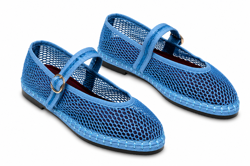 Blue Flabelus Isabella flats with pointed toes and sleek design, perfect for casual or dressy occasions.