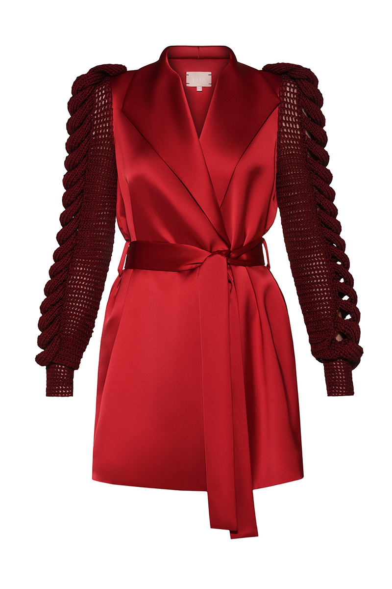 Red Liya cherry jacket featuring a classic design with a fitted silhouette and button closure, perfect for casual wear.