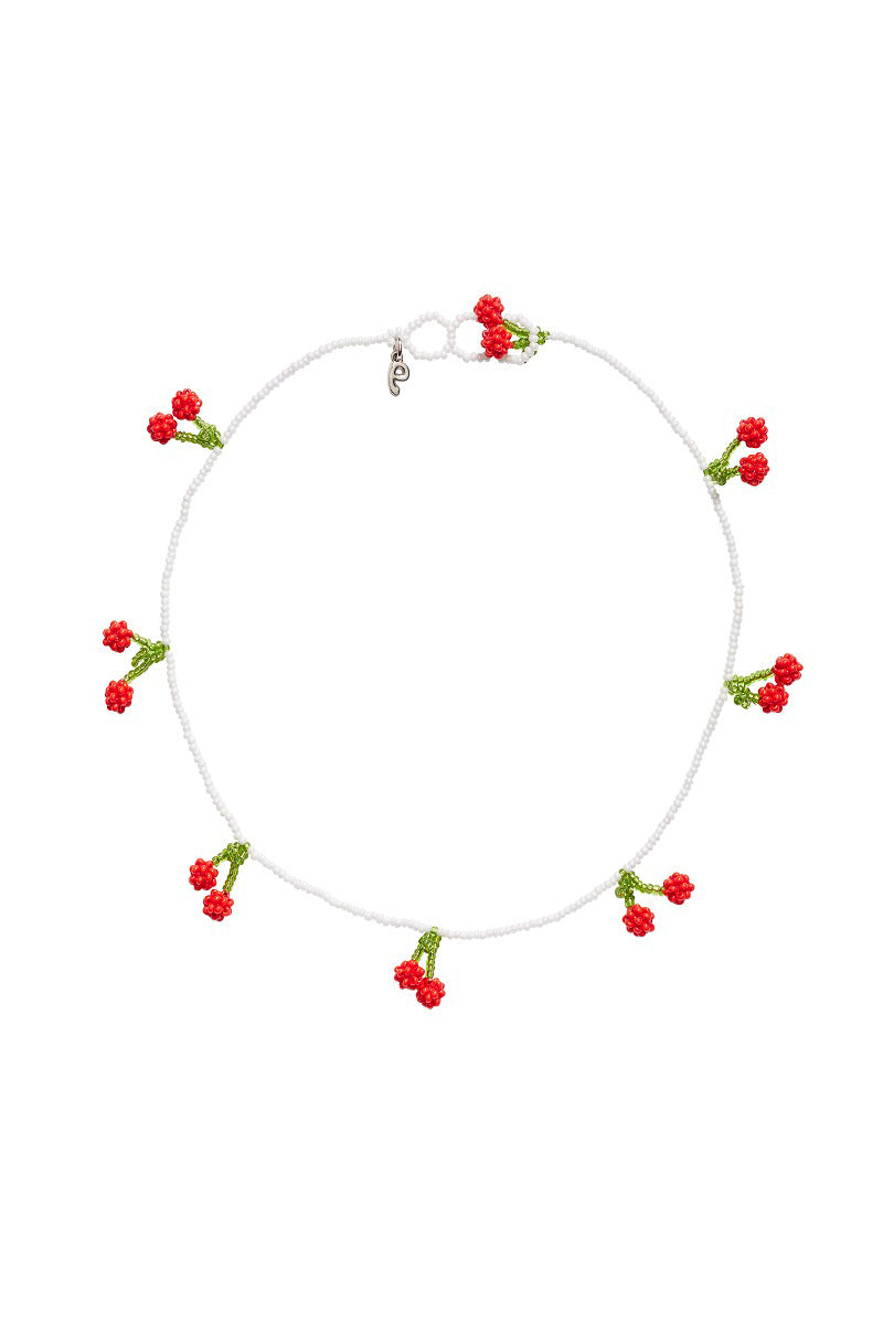 Pura Utz cherry necklace featuring a string of vibrant red cherry-shaped beads on a delicate chain.