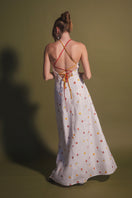 Colorful rainbow cherry tomato print maxi dress by Estefania, flowing fabric and vibrant pattern perfect for summer wear.