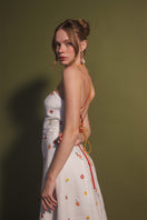Colorful rainbow cherry tomato print maxi dress by Estefania, featuring a flowing silhouette and vibrant pattern.