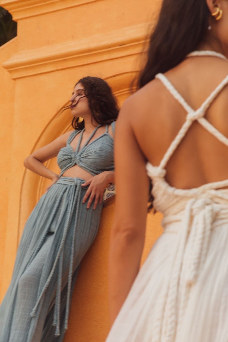 Kasia Kulenty Chiara Aqua co-ord set featuring a matching top and pants in vibrant aqua fabric.