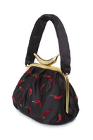 Black Bella shoulder bag by Sarah's Bag featuring chili pepper appliqué and sleek design for stylish everyday wear.