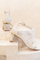 Ivory Chloe leather block pearl heels by Freya Rose, showcasing elegant design with pearl accents and sturdy block heel.